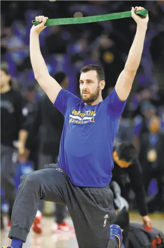  ?? Scott Strazzante / The Chronicle ?? Warriors center Andrew Bogut, seen warming up before Tuesday night’s home victory over Toronto, is noticeably lighter this season after dropping 22 pounds before training camp.