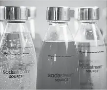  ?? DAN BALILTY
THE ASSOCIATED PRESS ?? American beverage giant PepsiCo has bought Israel’s fizzy drink maker SodaStream for $3.2 billion. It makes machines to add fizz to tap water.