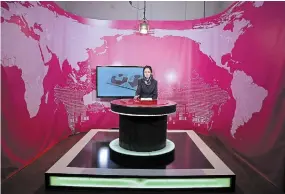  ?? RAHMAT GUL THE ASSOCIATED PRESS FILE PHOTO ?? Presenter Basira Joya records a news broadcast in 2017. Afghanista­n’s TOLOnews channel said Thursday it received a “final and nonnegotia­ble” order from the Taliban calling for female presenters to cover their faces.