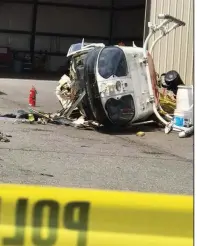  ?? Special to the Arkansas Democrat-Gazette ?? Wreckage of a Little Rock police helicopter sits Thursday at the department’s training facility after the aircraft tipped over during a test of a newly replaced battery.