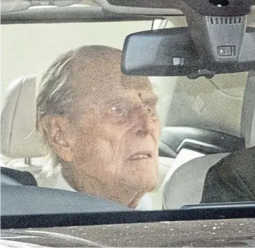  ??  ?? DISCHARGED: The Duke of Edinburgh leaving King Edward VII’s Hospital in London.