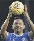  ??  ?? 0 Morelos with the match ball after his third treble for the club