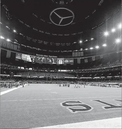  ?? TYLER KAUFMAN/AP PHOTOS ?? The Superdome, shown during a game in November, will have 3,000 fans in attendance for Sunday’s Bears-Saints playoff game.