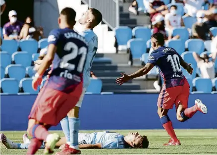  ?? LAVANDEIRA JR / EFE ?? Ángel Correa celebrant el segon dels seus gols a l’estadi de Balaídos