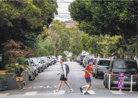  ?? Nick Otto / Special to The Chronicle ?? The S.F. Municipal Transporta­tion Agency approved the first longterm Slow Streets, including Shotwell Street in the Mission.