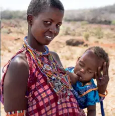  ??  ?? RIGHT: A Maasai mother breastfeed­ing her child, who slips seamlessly between sleeping and sucking. BELOW: Shirleen is one of many burn victims – Kenya’s overlooked tragedies.