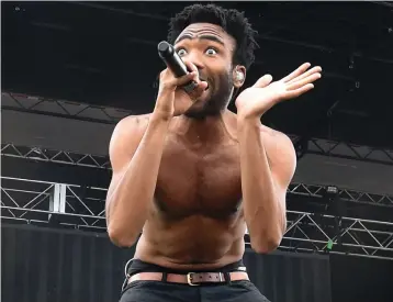  ?? (Kenneth K. Lam/Baltimore Sun/TNS) ?? CHILDISH GAMBINO performs at Pimiico Race Course in Baltimore in 2015.