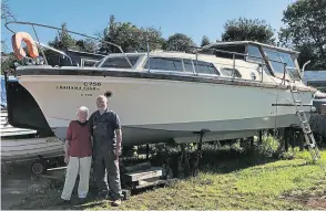  ?? ?? Kath and Peter Higgins with one of the boats stored in their yard.