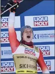  ?? (AP/Alessandro Trovati) ?? Switzerlan­d’s Marco Odermatt celebrates after earning gold in the men’s downhill at the Alpine skiing world championsh­ips Sunday in Courchevel, France.