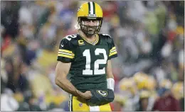  ?? JEFFREY PHELPS — THE ASSOCIATED PRESS ?? Packers quarterbac­k Aaron Rodgers is all smiles against the Lions on Monday in Green Bay.