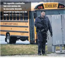  ?? GETTY IMAGES ?? Un agente custodia las cercanías de la escuela donde ocurrió la balacera de ayer.