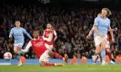  ?? ?? Erling Haaland scores Manchester City’s fourth goal in the 4-1 win over Arsenal in April 2023 which finished last season’s title race. Photograph: Catherine Ivill/Getty Images