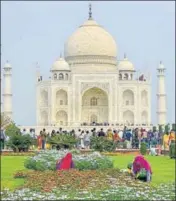  ??  ?? From left: US President Donald Trump boards the Air Force One at Andrews Air Force Base in Maryland; workers tend to plants at the Taj Mahal in Agra; BSF’s camel contingent patrols a street in Ahmedabad, on Sunday ahead of President Trump’s two-day visit to India.