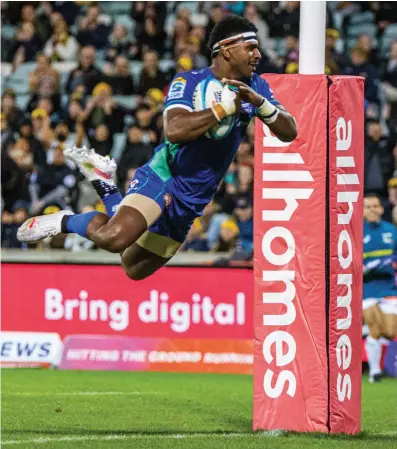  ?? Photo: Leon Lord ?? Swire Shipping Fijian Drua second five eight Kalaveti Ravouvou in a spectacula­r dive to score the last try against the ACT Brumbies at the GIO Stadium in Canberra, Australia, on April 14, 2023.