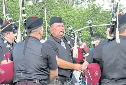  ??  ?? Pipe major Iain Finlay of Glenrothes and District Pipe Band who were crowned champions in section 4A.