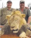  ??  ?? Palmer, left, with Cecil the lion