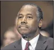  ?? ZACH GIBSON / AP FILE ?? Ben Carson was confirmed as Housing and Urban Developmen­t Secretary.