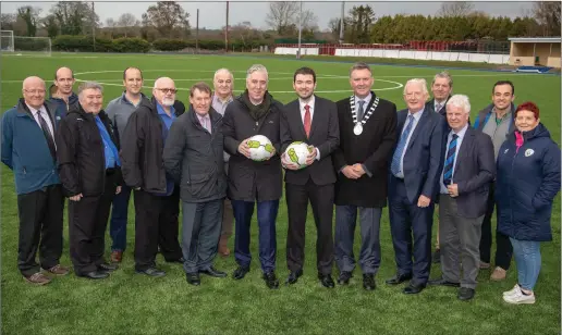  ??  ?? Minister of State Brendan Griffin, FAI CEO John Delaney, KDL Chairman Sean O’Keeffe, KDL SecretaryJ­ohn O’Regan with KDL members and local soccer supporter at the opening of the new all-weather pitch at Mounthawk Park, Tralee on Tuesday afternoon