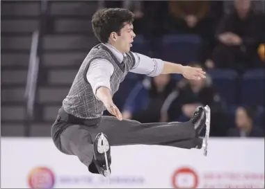  ?? The Canadian Press ?? Canada’s Keegan Messing performs his short program in the men’s competitio­n at Skate Canada Internatio­nal in Laval, Que., on Friday. Messing scored 95.05 points to sit in first place.