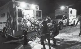  ?? Helen H. Richardson / The Denver Post ?? Rescue personnel on Monday put a snowshoer who was rescued after going missing overnight Sunday into an ambulance near the Nordic Center at Eldora Ski Area near Nederland. The snowshoer, Jennifer Cornell, suffered some frostbite but is generally in good spirits, her family said.