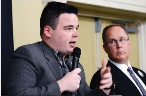  ?? WAYNE EMDE/Special to The Daily Courier ?? Vernon mayoral candidate Erik Olesen responds to a question during Tuesday’s election forum sponsored by the Vernon Chamber of Commerce and the Downtown Vernon Associatio­n. Darrin Taylor looks on.