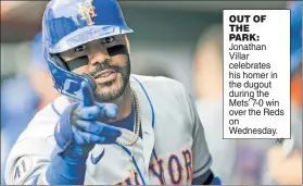  ?? AP ?? OUT OF THE PARK: Jonathan Villar celebrates his homer in the dugout during the Mets’ 7-0 win over the Reds on Wednesday.