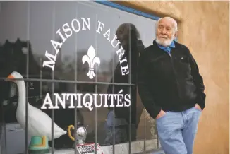  ?? MORGAN TIMMS/Taos News ?? Robert Faurie stands for a portrait outside Maison Faurie Antiquitie­s Saturday (Dec. 12) on Taos Plaza.