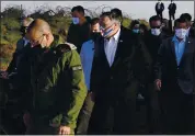  ?? PATRICK SEMANSKY, POOL — THE ASSOCIATED PRESS ?? Secretary of State Mike Pompeo, center, arrives for a security briefing on Mount Bental in the Israeli-controlled Golan Heights, near the Israeli-Syrian border, Thursday.