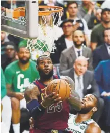  ?? Getty Images ?? Cleveland’s LeBron James, who had a sub-par performanc­e in Game 1 against Boston, goes up for two of his 42 points in Game 2. James had 12 assists and 10 rebounds in the Cavaliers’ loss. Boston is up 2-0 going into Saturday’s Game 3.