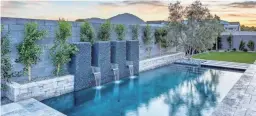  ??  ?? The $2.54 million estate, sold by Shea Homes Arizona Limited Partnershi­p, has a resort-style pool with waterfall accents.