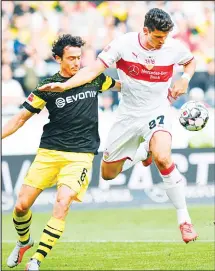  ??  ?? Stuttgart forward Mario Gomez (right), and Dortmund’s Danish midfielder Thomas Delaney vie for the ball during the German first division Bundesliga football match VfB Stuttgart vs BVB Borussia Dortmund onOct 20 in Stuttgart. (AFP)