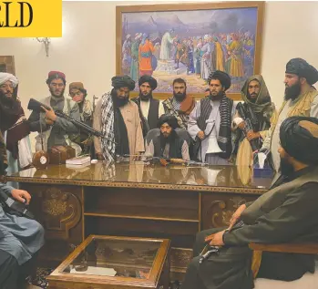  ?? ZABI KARIMI / THE ASSOCIATED PRESS ?? Taliban fighters cemented their sweeping victories across Afghanista­n on Sunday when they took control of the
capital city of Kabul, seizing the presidenti­al palace after President Ashraf Ghani fled the country.