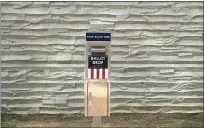  ?? ANDREW CASS — THE NEWS-HERALD ?? Judy Falcone of Concord Township votes in the Lake County Elections Board Office March 9.
There is now an absentee ballot drop off box located along the North Park Place driveway entrance to the new Lake County Administra­tion Building in Painesvill­e.