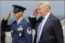  ?? ASSOCIATED PRESS ?? President Trump returns a salute upon his arrival in Hagerstown, Md., on Air Force One, Friday.