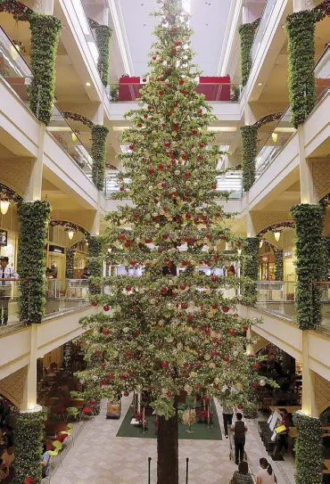  ??  ?? Adding to the distinct vibrance of Rockwell Center is its four-story Christmas tree adorned with beautiful ornaments and 50,000 sparkling light bulbs making it more eyecatchin­g and festive.