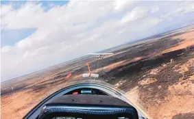  ?? ALEXIA SEVERSON/LAS CRUCES SUN-NEWS ?? Seen is a view from the Grob 103C Twin III SL, named ML, during a demonstrat­ion flight provided by the White Sands Soaring Associatio­n in Alamogordo recently.