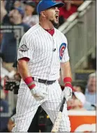  ?? PATRICK SEMANSKY/AP PHOTO ?? Kyle Schwarber of the Cubs reacts to his home run hit during the MLB Home Run Derby on Monday at Nationals Park in Washington.