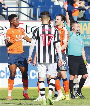  ??  ?? OFF YOU GO! Luton Town’s Danny Hylton receives his marching orders