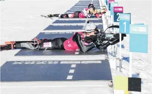  ??  ?? The Wright stuff . . . Campbell Wright, of Hawea Flat, shoots and skis in the men’s 7.5km sprint biathlon at the Youth Winter Olympics in Lausanne, France, yesterday. Wright finished fourth to go with his earlier sixth in the 12.5km event.