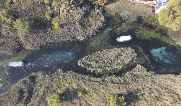  ?? ?? An aerial view of Azmak Creek, part of the area declared a “Slow City” by the Internatio­nal Cittaslow Union General Secretaria­t, Muğla, Türkiye, April 11, 2024.