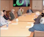  ?? doug Walker ?? Members of the Floyd Medical Center governing bodies agreed to a letter of intent to merge with Atrium Health System. Details of the deal are expected to take another six to eight months to iron out.