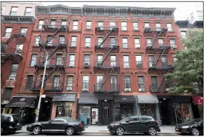  ?? AP/MARY ALTAFFER ?? The Kushner Cos. real estate firm owns these buildings at 331 (from left), 333 and 335 E. Ninth St. in the East Village neighborho­od of New York City.