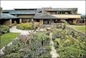  ?? BILL HOGAN/CHICAGO TRIBUNE 2001 ?? The garden at Taliesin in Spring Green, Wisconsin, was designed by Frank Lloyd Wright. The architectu­re school is set to close at the end of June.