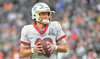  ?? AP ?? AFC quarterbac­k Justin Herbert was named offensive MVP of the Pro Bowl after tossing two touchdown passes in the first half.