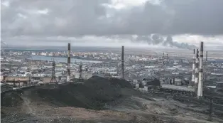  ?? MAXIM BABENKO/NEW YORK TIMES ?? A view earlier this month of Norilsk, a Russian Arctic nickel-mining hub of 180,000 people. Residents of Norilsk, Russia’s most isolated major city, long felt separated from their country’s turbulence before a mining company strung a fiber-optic cable across 600 miles of tundra and cheaper, faster internet suddenly replaced a slow and shaky satellite link.