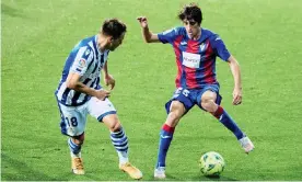  ?? Photograph: Ricardo Larreina/Shuttersto­ck ?? Bryan Gil tries to trick his way past Andoni Gorosabel of Real Sociedad in April during his loan with Eibar.