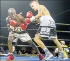  ?? Picture: GALLO IMAGES ?? BLOW BY BLOW: Siyabonga Siyo, left, squares up to Hekkie Budler in their WBA Pan Africab mini-flyweight bout at Emperors Palace in Johannesbu­rg on Saturday