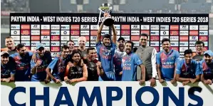  ?? PTI ?? The Indian team after winning the T20I series 3-0 against the West Indies. —