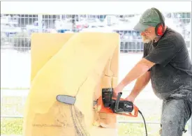  ??  ?? CARVING: Whangarei’s Justin Murfitt gets his piece of Oamaru stone under way with a chainsaw at the Whangarei’s Sculpture Symposium.Whangarei’s Justin Murfitt gets his piece of Oamaru stone under way with a chainsaw at the Whangarei’s Sculpture...