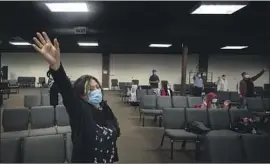  ?? ?? LEONOR GOMEZ, also a pastor, leads a prayer group at Iglesia de Cristo Lluvias de Paz in Gardena. “The truth must come out,” she says.